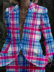 A slim-fit blazer featuring a vibrant blue, pink, and white plaid digital print.