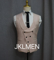 A light pink double-breasted vest with a shawl collar worn over a white shirt and black tie.