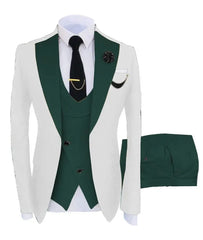 A three-piece slim fit suit featuring a white blazer with green lapels, a green vest, and pants.