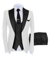 A three-piece slim fit suit featuring a white blazer with black lapels, a black vest, and pants.