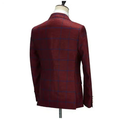 A back view of a maroon suit jacket featuring a blue plaid pattern on a mannequin.