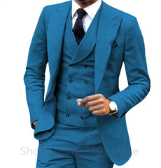 A man wears a slim-fit, bright blue three-piece suit with a double-breasted vest and black tie.