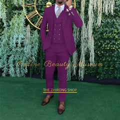A man wears a purple three-piece suit consisting of a single-breasted jacket, vest, and trousers.
