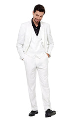 A man wears a white three-piece slim fit suit with a black button-down shirt and black shoes.