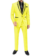 A man wears a bright yellow three-piece suit with black lapel trim, a black shirt, and a tie.
