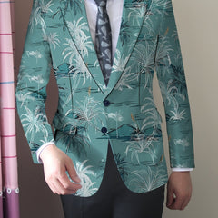 A men's regular fit blazer in teal featuring a white coconut tree print and button closure.