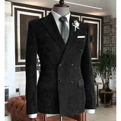 A black double-breasted corduroy suit jacket with a notched collar on a mannequin.