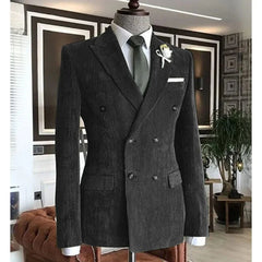 A charcoal grey corduroy double-breasted suit jacket with a notched lapel on a mannequin.