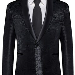A black paisley patterned men's tuxedo jacket with a satin shawl lapel and a matching tie.