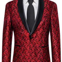A red paisley patterned men's suit jacket with a black shawl lapel, white shirt, and black tie.