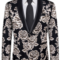 A men's black blazer featuring a white floral pattern, a black shawl lapel, and a matching tie.