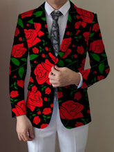 A man wears a black blazer featuring a vibrant red rose floral pattern with a white shirt and tie.