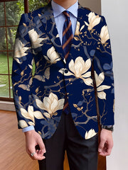 A men's single-breasted navy blue blazer featuring an all-over cream floral and butterfly print.
