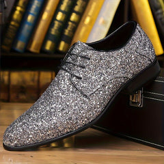 Men's silver glitter lace-up dress shoes with a pointed toe.