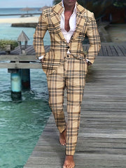 A man wears a tan plaid skinny-fit suit with a lapel collar and pockets while walking barefoot.