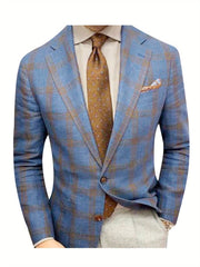 A blue plaid blazer with a notched lapel, worn over a striped shirt and brown tie.
