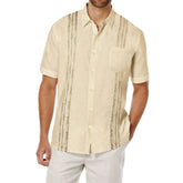A beige short-sleeve button-down shirt with vertical geometric embroidery and a chest pocket.