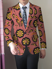 A men's skinny fit floral suit jacket in a dusty rose color with a lapel collar and button closure.