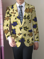 A men's skinny fit floral suit jacket in a light yellow polyester blend with a lapel collar.