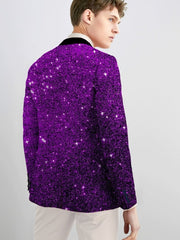 A man wears a slim-fit blazer featuring a vibrant purple galaxy print and a black lapel.