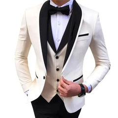 A white tuxedo jacket with black shawl lapels worn over a matching vest and black trousers.