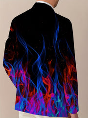 A man wears a blazer featuring a vibrant blue and red flame print pattern on a black background.