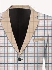 A men's casual suit jacket featuring a white base with a blue and brown grid pattern and tan lapels.