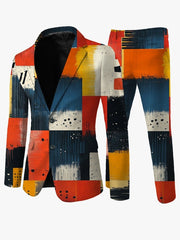 A men's casual suit featuring a vibrant, multicolored abstract block print pattern.