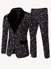 A men's skinny fit suit featuring a black blazer with a velvet lapel and matching pants in a multicolored confetti print.