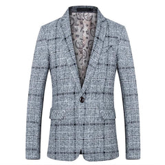 A single-breasted men's blazer in a grey plaid pattern with a patterned interior lining.