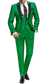 A man wears a vibrant green three-piece suit with a black peak lapel, vest, and polka dot tie.