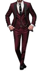 A man wears a burgundy three-piece suit with a black peak lapel, vest, and matching trousers.