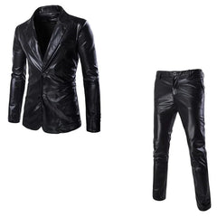A black two-piece suit featuring a slim-fit, two-button blazer and matching trousers.