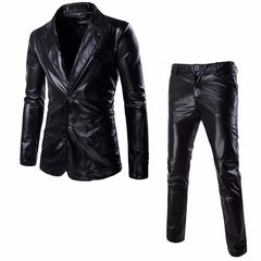 A black two-piece suit featuring a slim-fit blazer with two buttons and matching trousers.