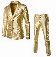 A two-piece men's suit featuring a slim-fit, two-button blazer and matching pants in shiny gold.