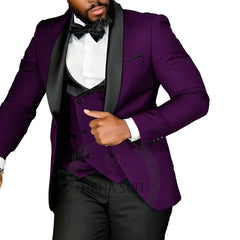 A man wears a slim-fit purple tuxedo jacket with black shawl lapels over a matching vest.