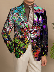 A man wears a skinny-fit blazer featuring a vibrant, multicolored abstract print.