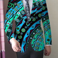 A man wears a skinny fit blazer featuring a vibrant, multicolored abstract floral print.