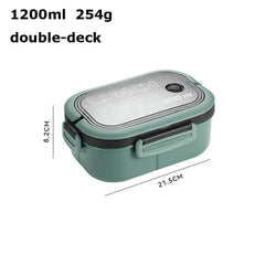 A sage green double-deck lunch box with a rectangular shape and a labeled lid.