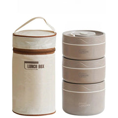 A three-tier stackable lunch box set with a matching insulated carrying bag.