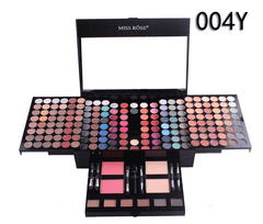 A Miss Rose piano box makeup palette featuring numerous eyeshadows, blushes, and applicators.