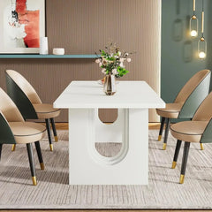 A modern rectangular white dining table with a unique U-shaped pedestal base.