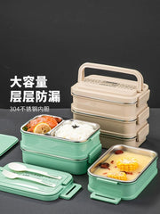 A multi-layer insulated lunch box with stainless steel compartments and a carrying handle.