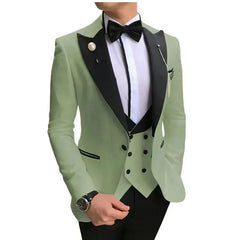 A slim-fit sage green three-piece suit with a black shawl lapel, vest, and bow tie.
