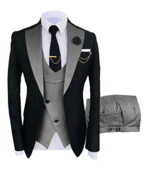 A three-piece men's tuxedo set featuring a black jacket with grey lapels, a grey vest, and trousers.