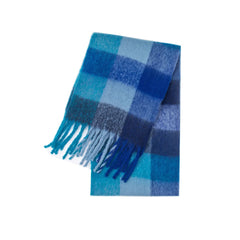 A long, soft blue plaid scarf with fringe ends, featuring a mix of light and dark blue tones.