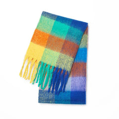 A long, soft-textured scarf featuring a vibrant, multi-colored plaid pattern and fringed ends.