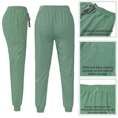 Sage green scrub pants with an elastic drawstring waistband and side pockets.