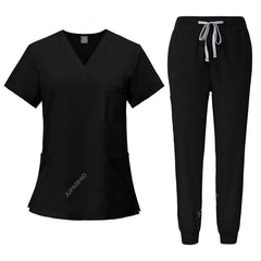 A black women's scrub set featuring a V-neck top with pockets and matching jogger-style pants.