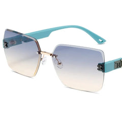 Rimless square sunglasses for women featuring blue gradient lenses and light blue temples.
